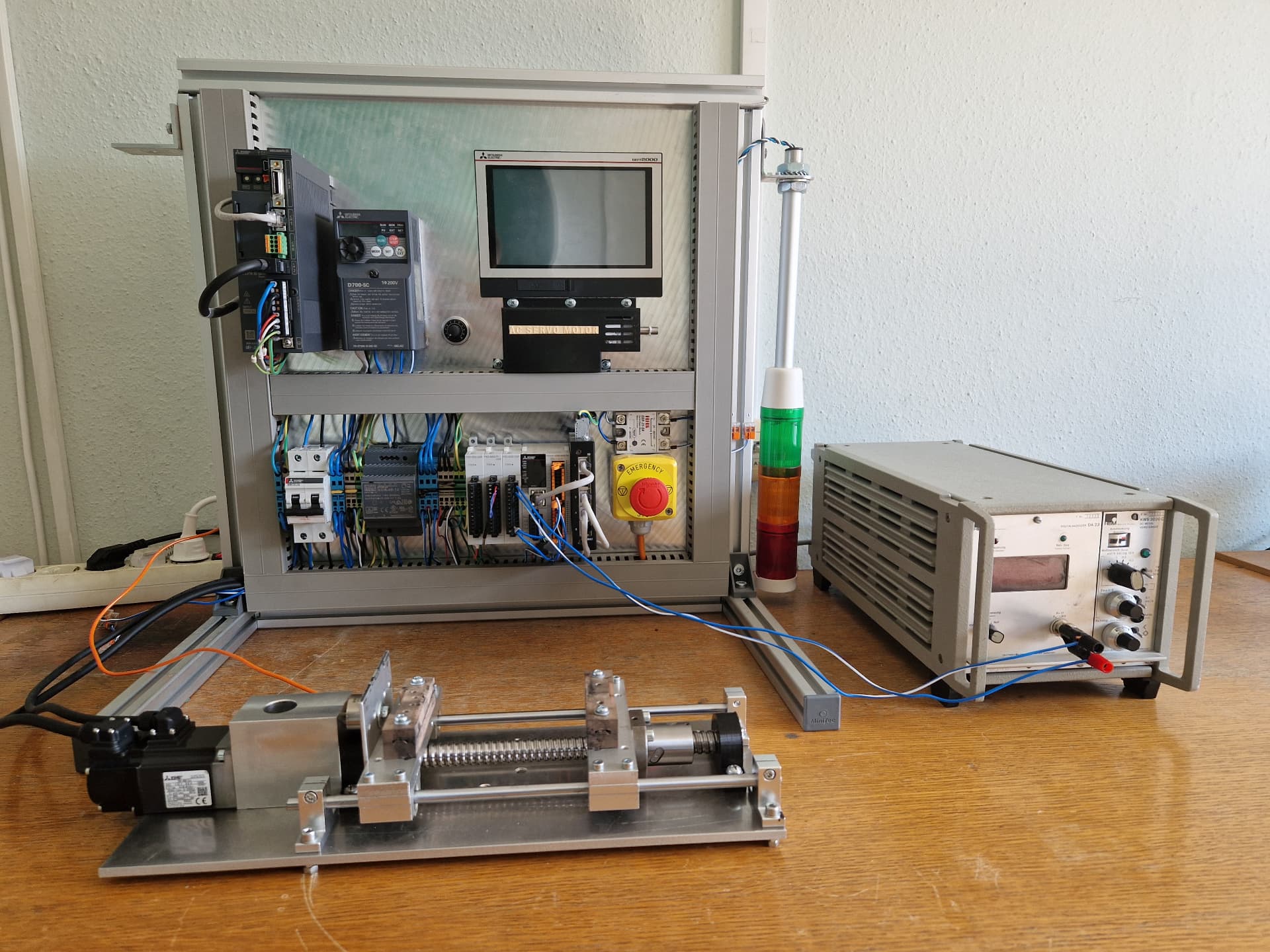 Mitsubishi PLC, servo drive and HMI control panel with linear test axis