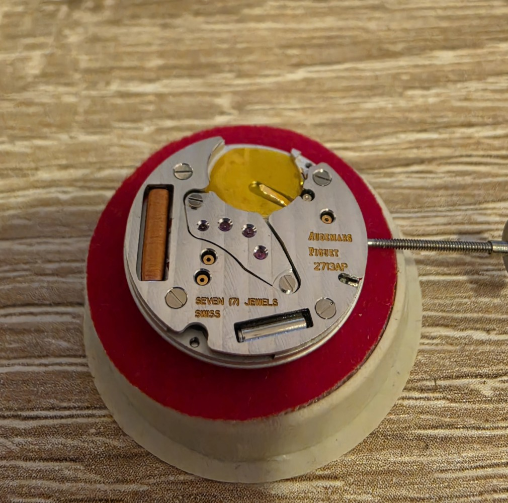 Audemars Piguet 2713AP quartz calibre on a movement holder